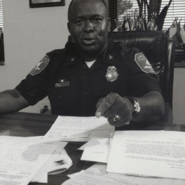 Chief Reuben Greenberg in his office, 2000